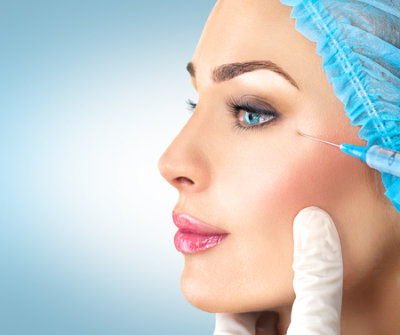 50989051 – beauty woman gets facial injections. cosmetology